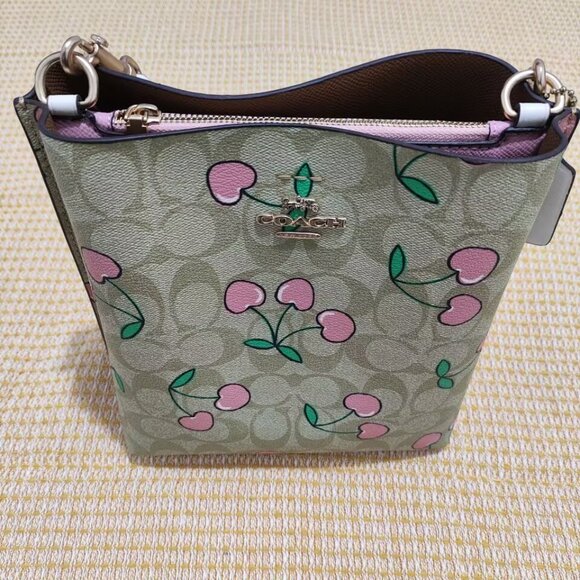 Coach Handbags - Coach Cherry Print Crossbody Bucket Bag with Top Handle